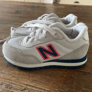Toddler new balance shoes, white with navy and orange accents. Size 5.5